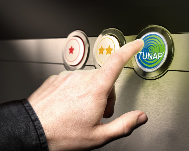TUNAP-løsninger Hånd peger på en knap med TUNAP-skrift